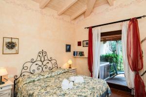 Postel nebo postele na pokoji v ubytování Villa Rosa - Piscina privata