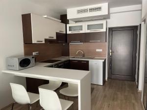 Η κουζίνα ή μικρή κουζίνα στο Jókai24 +4 φωτογραφίες