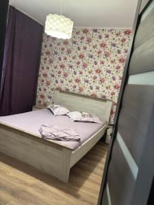 Postel nebo postele na pokoji v ubytování Apartament Radu + 10 fotografií