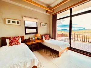 Letto o letti in una camera di Kenting COMIC B&B&SPRING