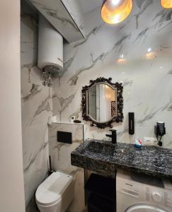 Koupelna v ubytování Luxury Suites Artisti Elena 2