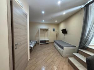 Letto o letti in una camera di PM 7 Via Sant'Antonio ai Monti