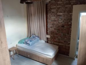 Voodi või voodid majutusasutuse Tbilisi Royal View toas