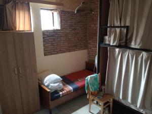 Voodi või voodid majutusasutuse Tbilisi Royal View toas