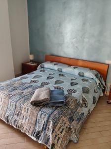 En eller flere senge i et værelse på Acquapetra, appartamento per l'estate