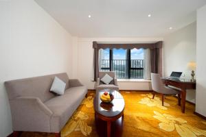 Posezení v ubytování Xinghui Hotel