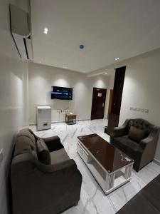 Posezení v ubytování الاجنحة الماسية للشقق المخدومة 2