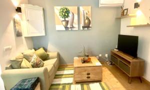 Μια τηλεόραση ή/και κέντρο ψυχαγωγίας στο Casa Vista Maroma Guest House