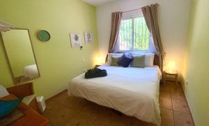 Ένα ή περισσότερα κρεβάτια σε δωμάτιο στο Casa Vista Maroma Guest House +98 φωτογραφίες