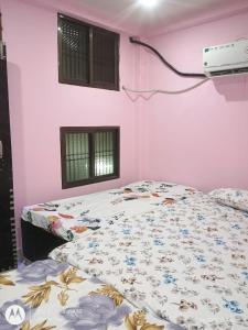 Katil atau katil-katil dalam bilik di Shlok homestay +2 gambar