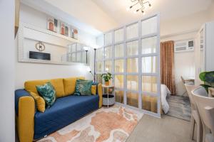 Posezení v ubytování LD Cozy Condo Unit - BE Residences near Cebu IT Park + 37 fotografií