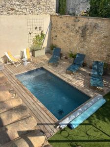 Imagen de la galería de Maison en pierres 6/8pers, piscine & sublime vue, en Puygiron