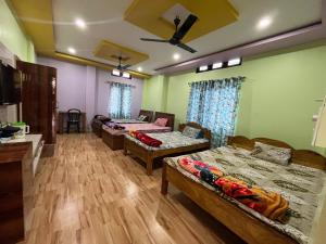 Gallery image of Maa Sumthira Lodge in Majuli +11 photos