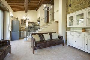 Kuchyň nebo kuchyňský kout v ubytování Villa L'Antico Mulino