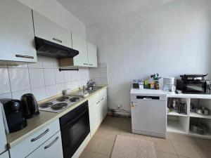 Kuchyň nebo kuchyňský kout v ubytování Charmante Ferienwohnung im Herzen von Lübeck