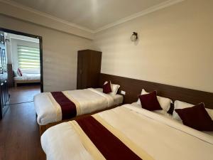 Krevet ili kreveti u jedinici u okviru objekta Hotel Sohum