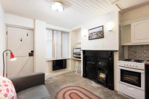 Kuchyň nebo kuchyňský kout v ubytování Discovery Cottage + 1 fotografie