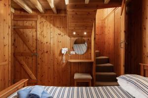 Postel nebo postele na pokoji v ubytování Discovery Cottage