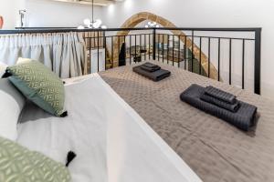 Posteľ alebo postele v izbe v ubytovaní Filoxenia House