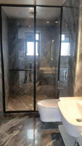 Koupelna v ubytování Floric Hotel