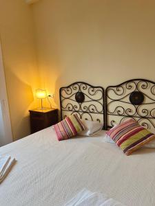 Postel nebo postele na pokoji v ubytování Villa Corti Lakeview