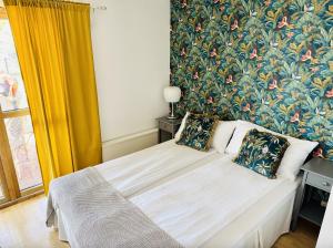 Postel nebo postele na pokoji v ubytování Hotell Bistro Port Sud
