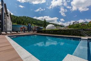 Bazén v ubytování Premium hotel & SPA nebo v jeho okolí