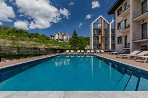 Bazén v ubytování Premium hotel & SPA nebo v jeho okolí