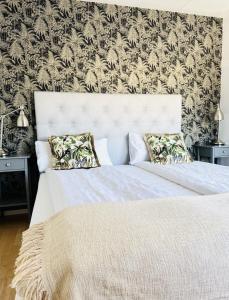 Postel nebo postele na pokoji v ubytování Hotell Bistro Port Sud