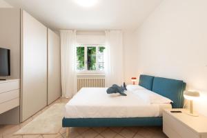 Кровать или кровати в номере Luxury Suites Collection - Virgilio 20