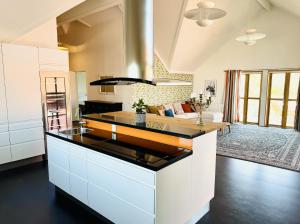 Kuchyň nebo kuchyňský kout v ubytování Hotell Bistro Port Sud