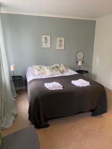 Postel nebo postele na pokoji v ubytování Snöå Bruk Hotell och konferens