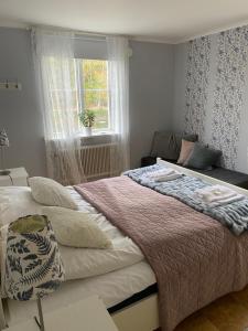 Postel nebo postele na pokoji v ubytování Snöå Bruk Hotell och konferens