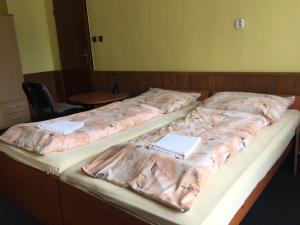 Postel nebo postele na pokoji v ubytování Hotel Reoneo + 3 fotografie