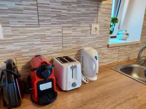 a kitchen with a counter top with appliances on it at Manto's House Lefkada in Évyiros