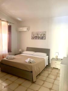 Postel nebo postele na pokoji v ubytování Villa Nasus + 1 fotografie