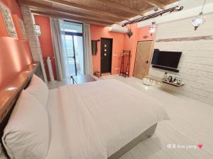 Uma cama ou camas num quarto em 田田圈