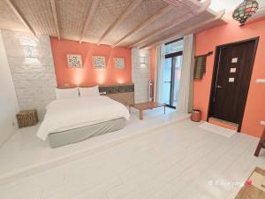 Uma cama ou camas num quarto em 田田圈
