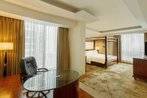 a hotel room with a table and a bed at The Westin Dhaka in Dhaka +23 photos