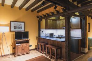 Kuchyň nebo kuchyňský kout v ubytování Apartamentos Villa de Potes