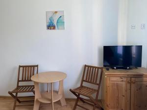 TV a/nebo společenská místnost v ubytování Dom Wczasowy Aleksandra
