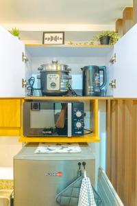 Kuchyň nebo kuchyňský kout v ubytování Consider It Yours - Stay Cozy with City Views