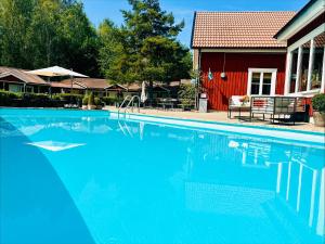 Bazén v ubytování Hotell Miskarp nebo v jeho okolí