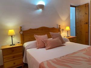 Postel nebo postele na pokoji v ubytování Casa Barca Cala Saona