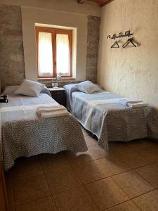 Postel nebo postele na pokoji v ubytování Casa Rural Espasa