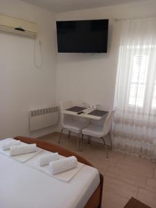 Studio apartman TEDY客房内的一张或多张床位