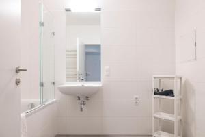 Ένα μπάνιο στο HIRSCH Apartments +16 φωτογραφίες