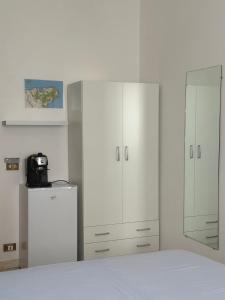 Letto o letti in una camera di Affittacamere Casa Flora