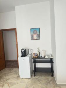 Set per la preparazione di tè e caffè presso Affittacamere Casa Flora