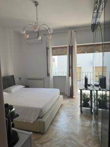 Letto o letti in una camera di Affittacamere Casa Flora
